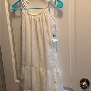 Girls white shoulder tie dress.